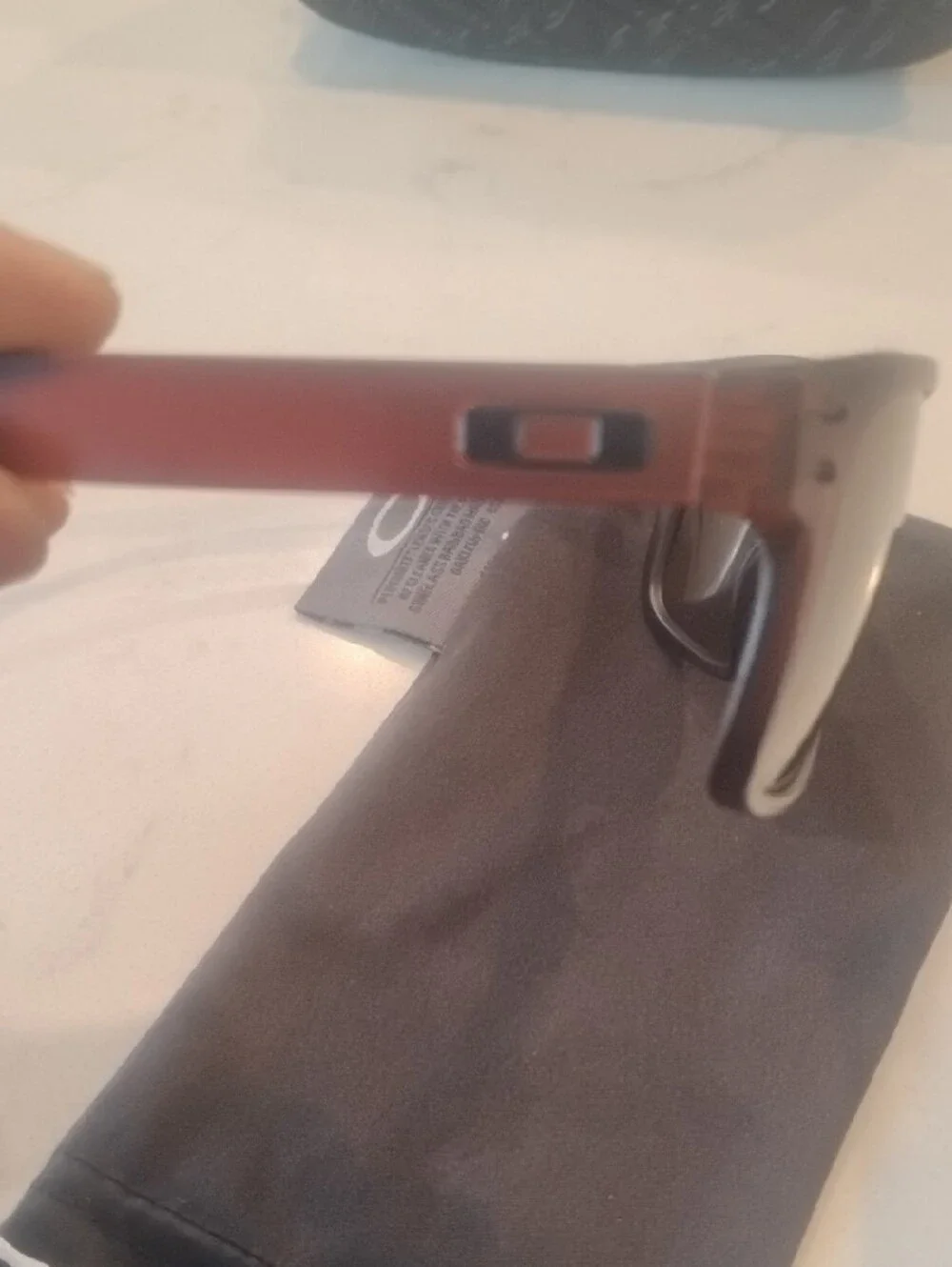 Oakley Brown Frame Sunglasses with Dark Lenses